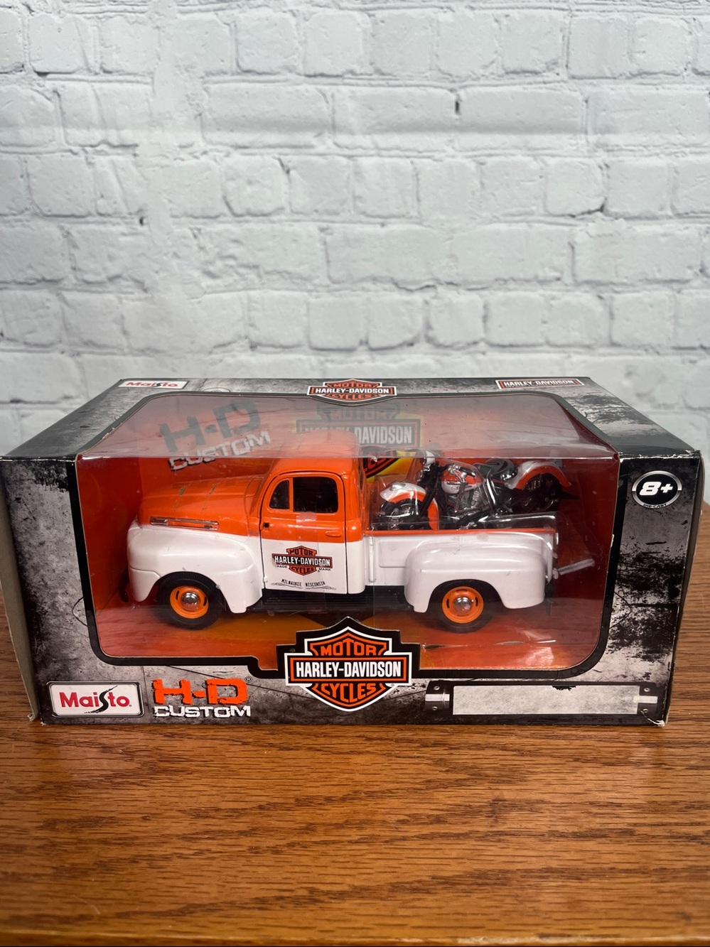 Authentic collectible Harley Davidson 1948 Ford model truck hauling a Panhead